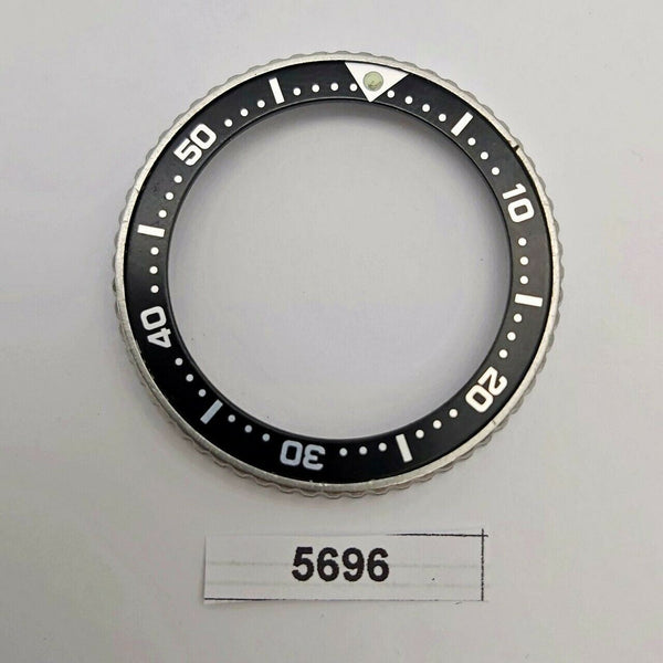 USED SEIKO MIDSIZED BEZEL WITH INSERT FOR 7S26 0030 SKX013 WATCH BVT05696
